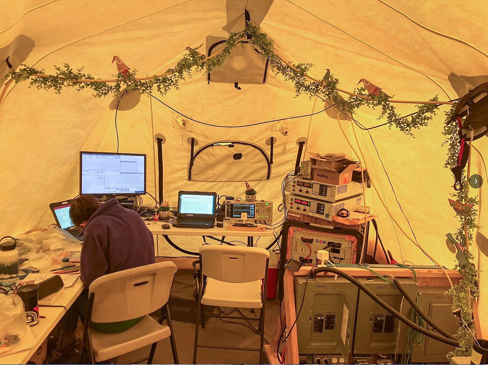 Tent setup at the site of the experiment in Greenland with Magna-Power “Tower of Power” (right)