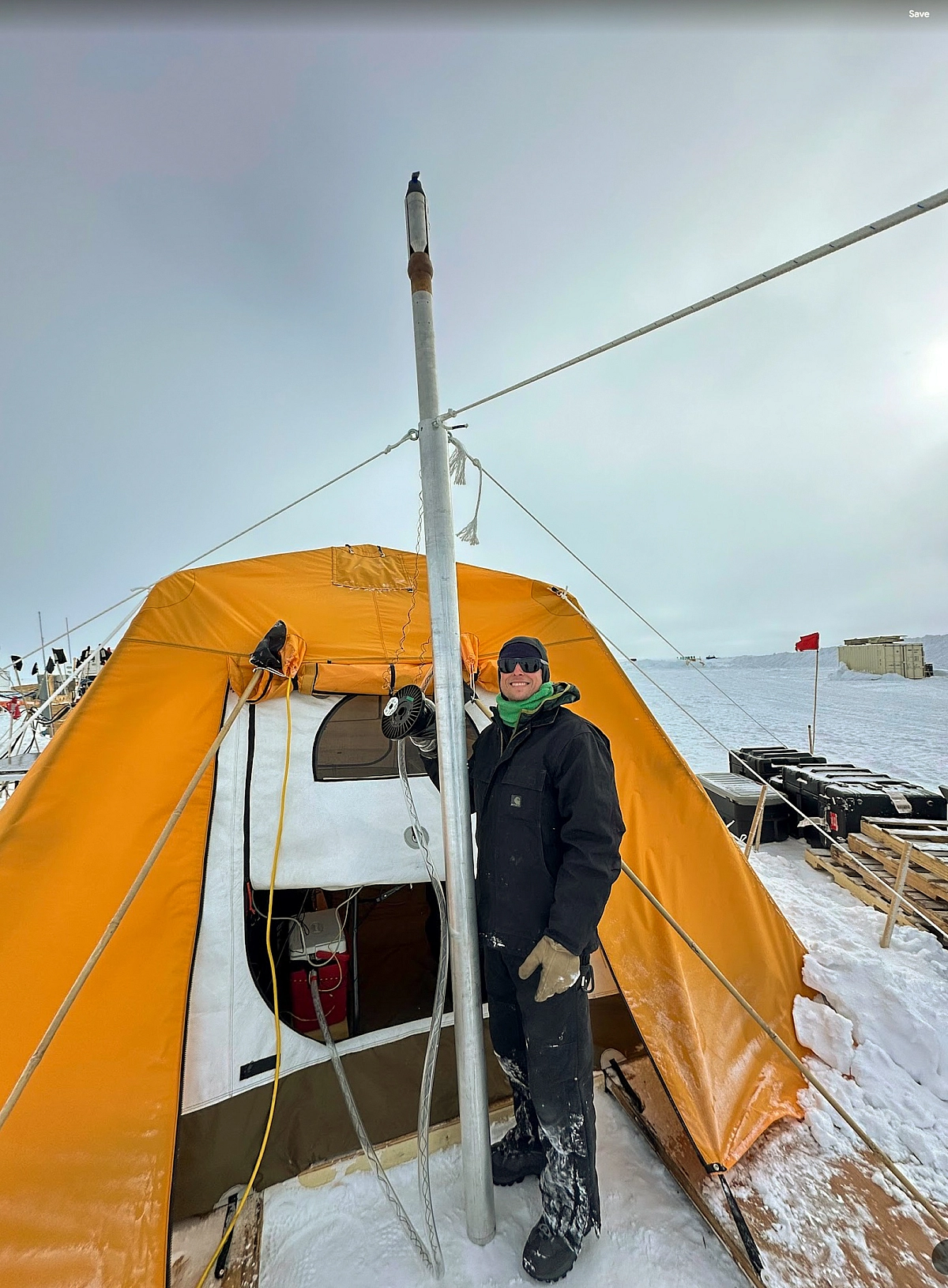 University of Washington Applied Physics Laboratory researcher, Justin Burnett, with Ice Diver probe on-site in Greenland.