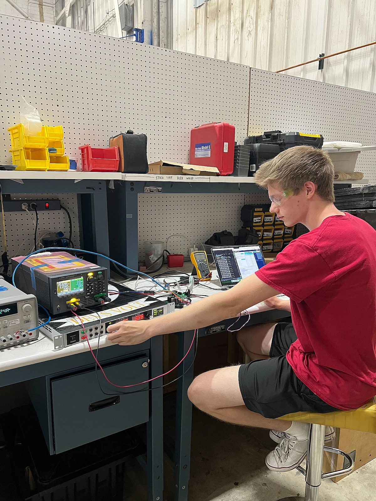 Solar and MPPT subteam member Luke Matheny, a rising MS ECE student at Georgia Tech, leading testing of the custom MPPT using Magna Power supplies.