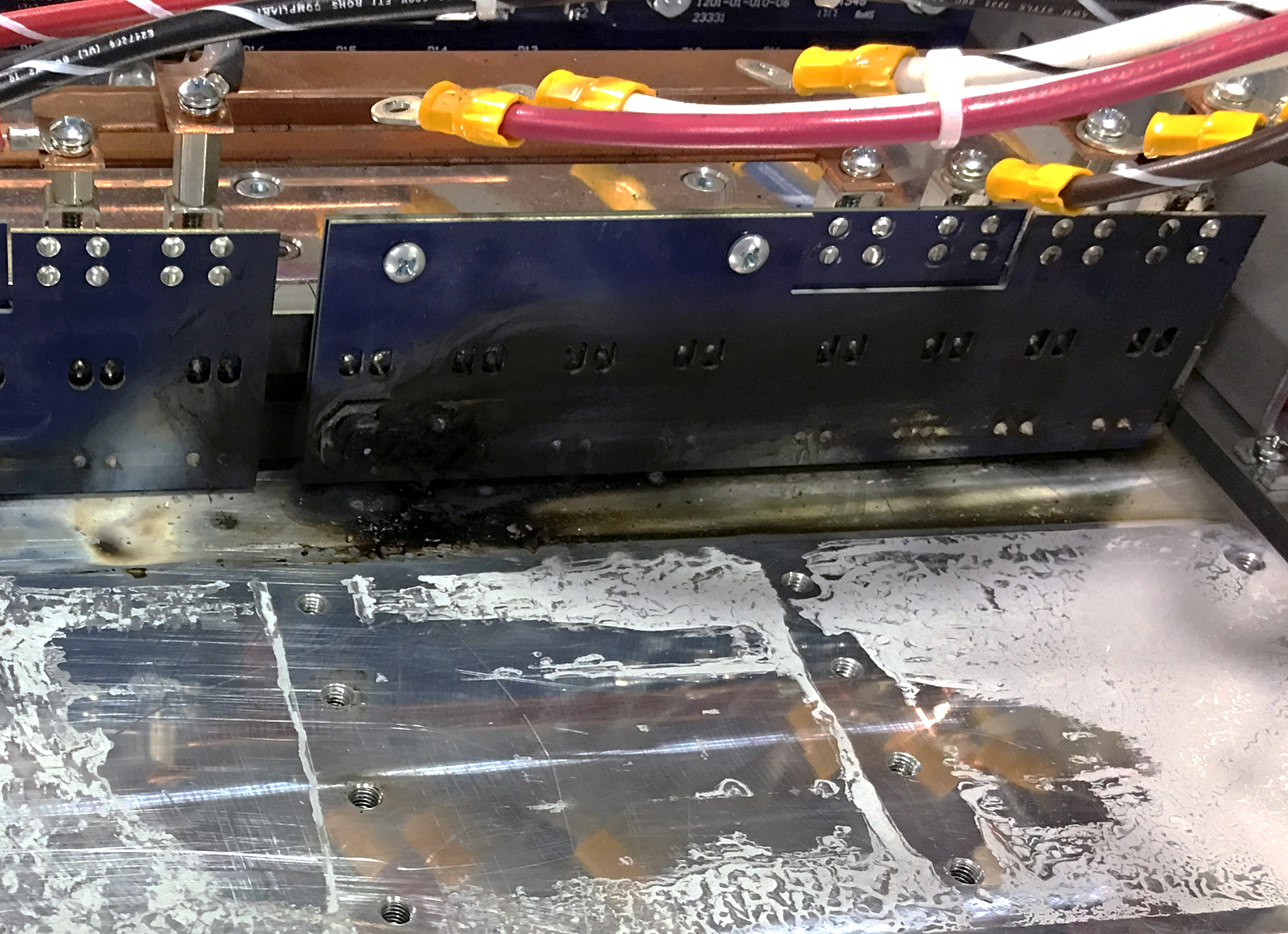 Fig 2. Charred printed circuit board in an electronic load due to high temperatures stemming from large air gaps between heat-producing components and the heatsink.