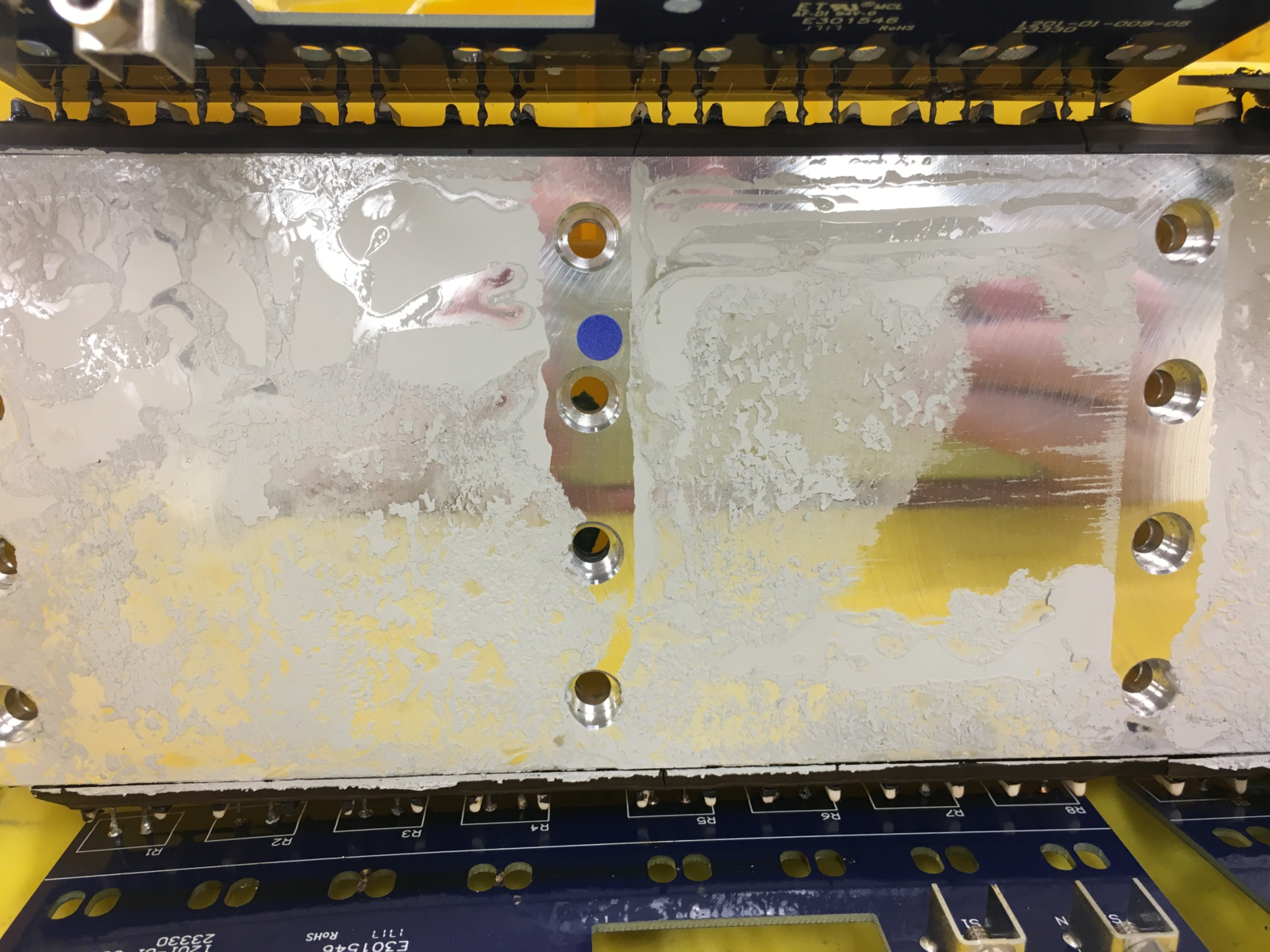 Fig 5. Missing thermal paste on metal interface plate due to poor application.