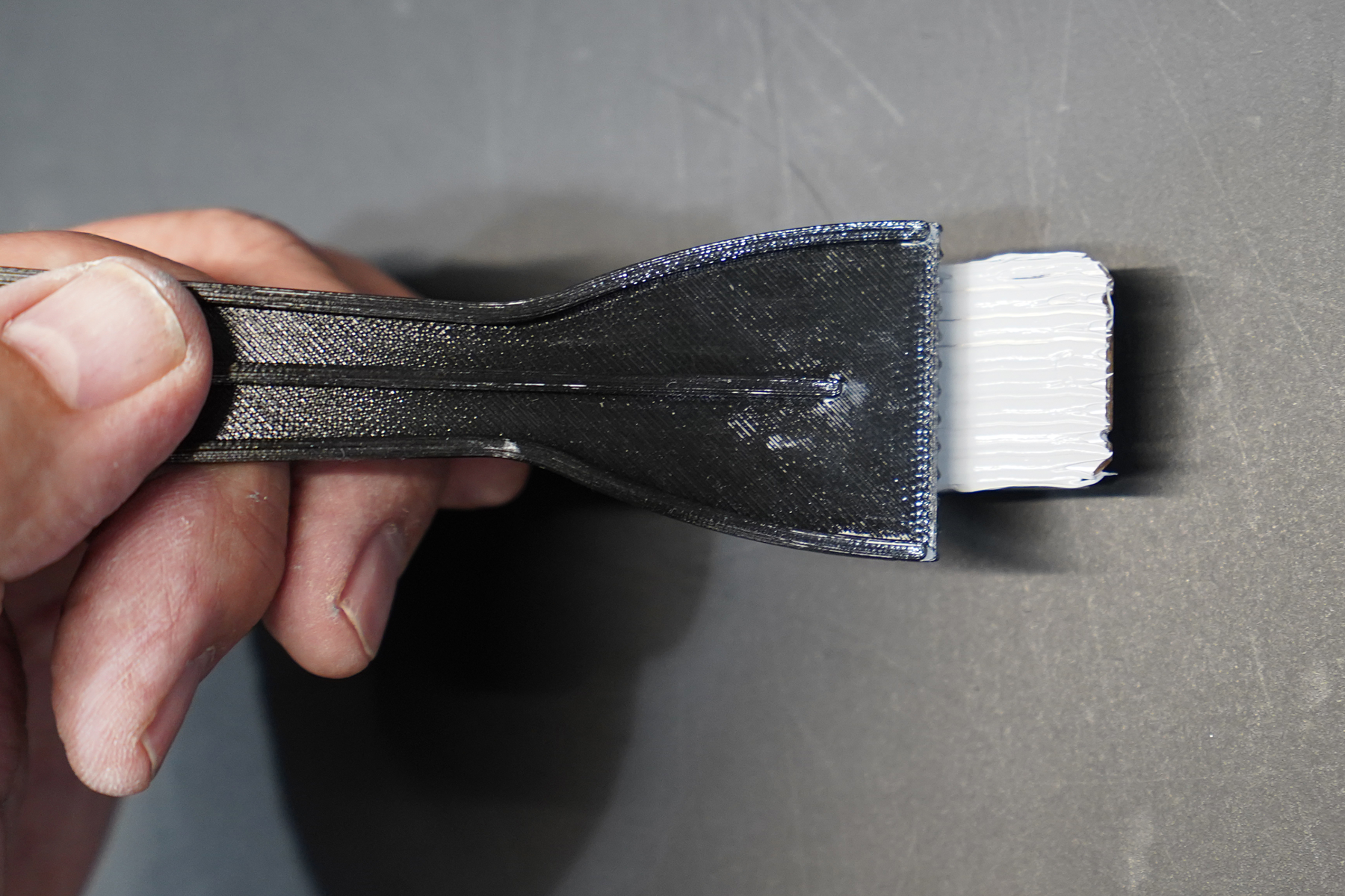 Fig 10. Spatula spreading of Pitel Paste AZ-01 thermal paste using 3D printed spatula.