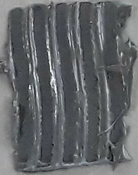 Fig 11. Angled serrated-edge spatula with varying angle and resulting thermal paste on the device: 45°, 0.45g; 60°, 0.35g; 90°, 0.3g